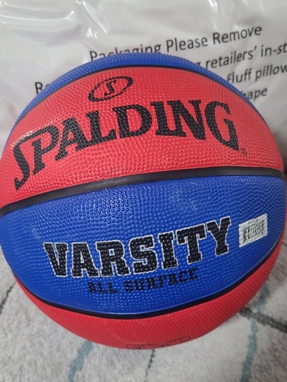 Brand new Spalding Varsity 29.5" red and blue basketball